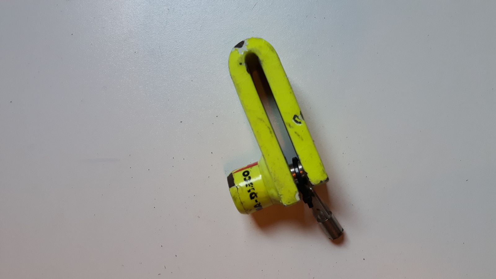 Remslot (geel) met 1 sleutel